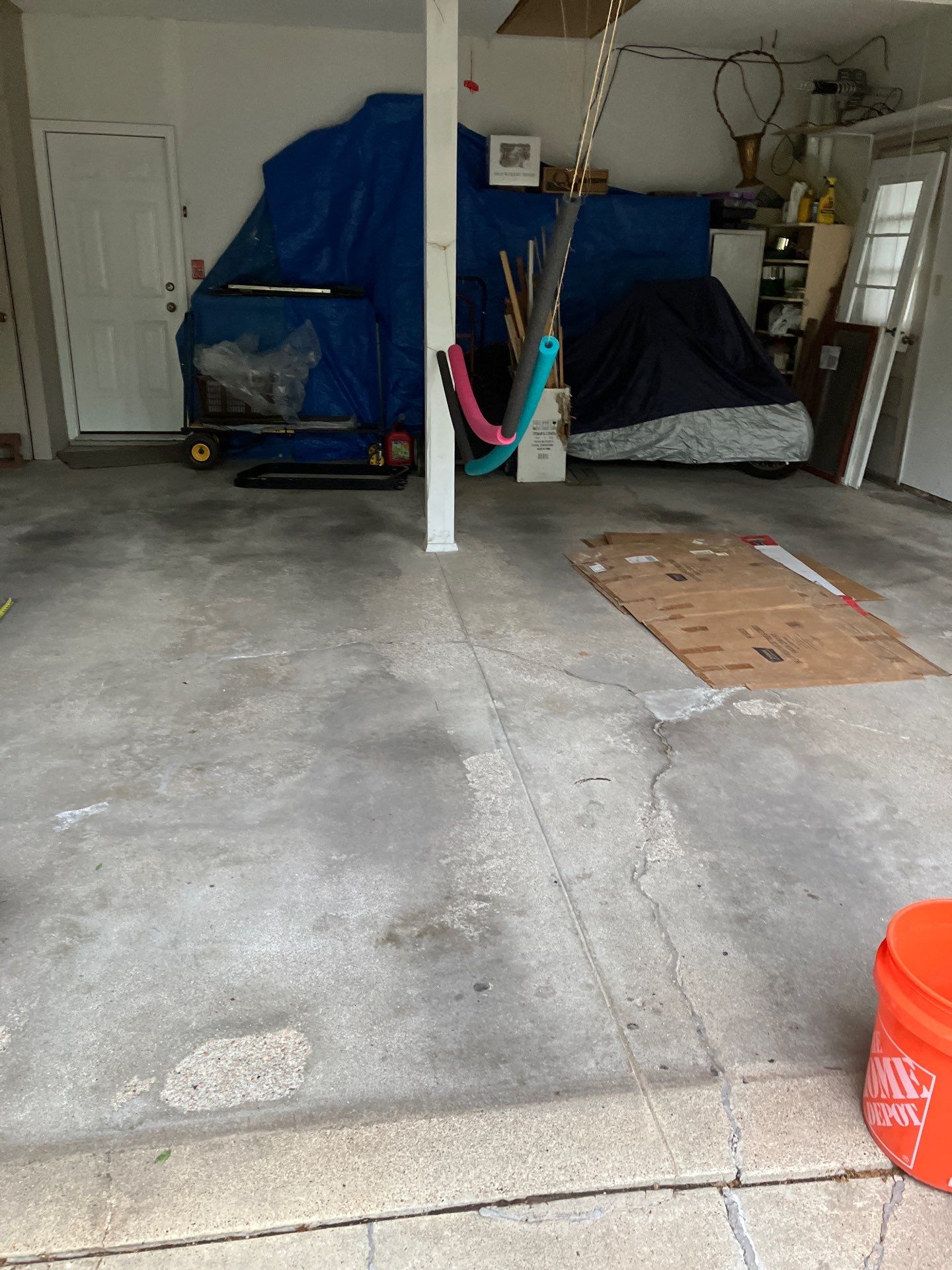 Underlying cause of cracked garage floor in Midwest homes
