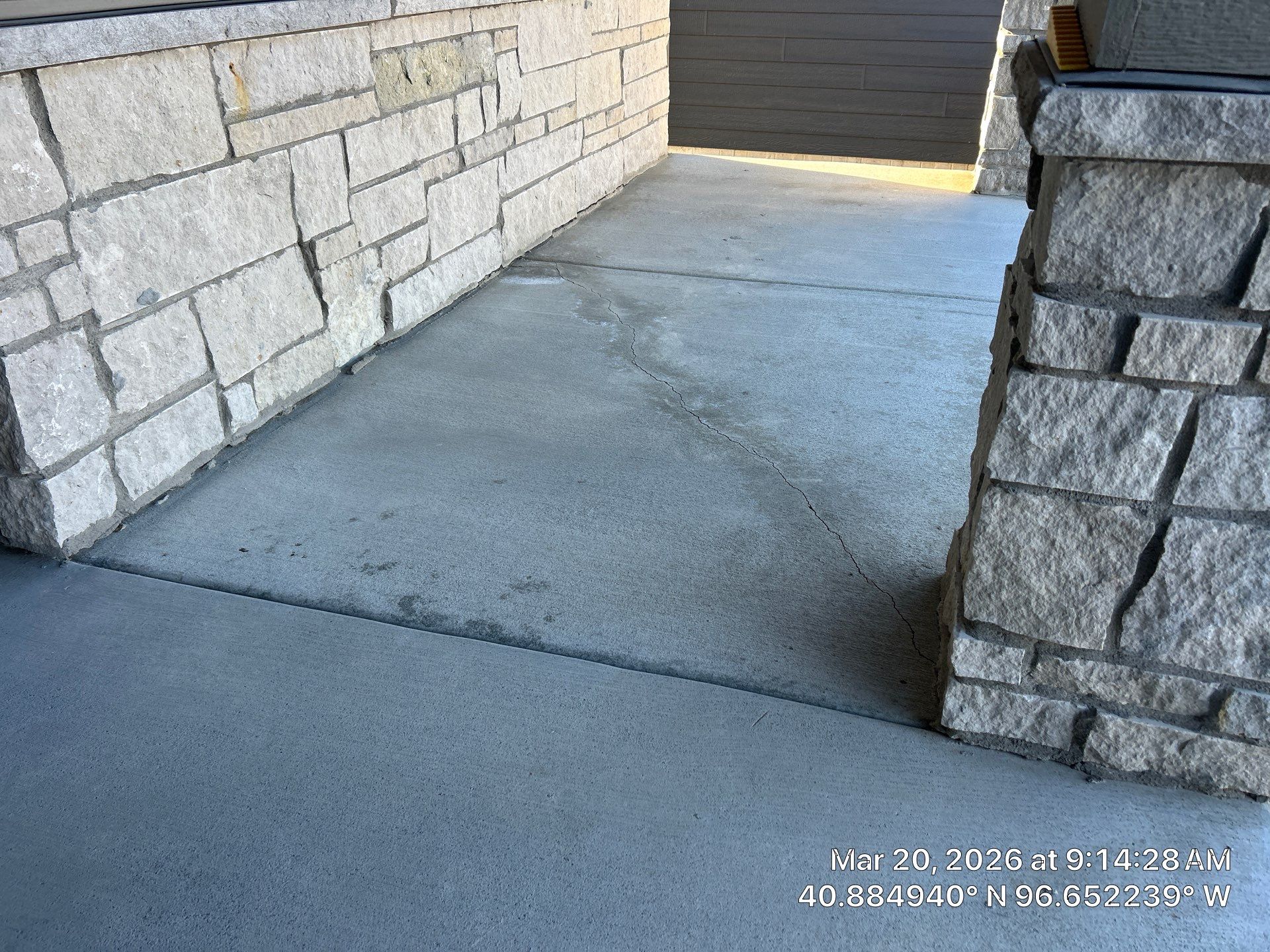 Early warning signs of cracked concrete on a Midwest home